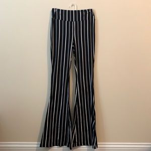 Black and white striped bell bottom pants